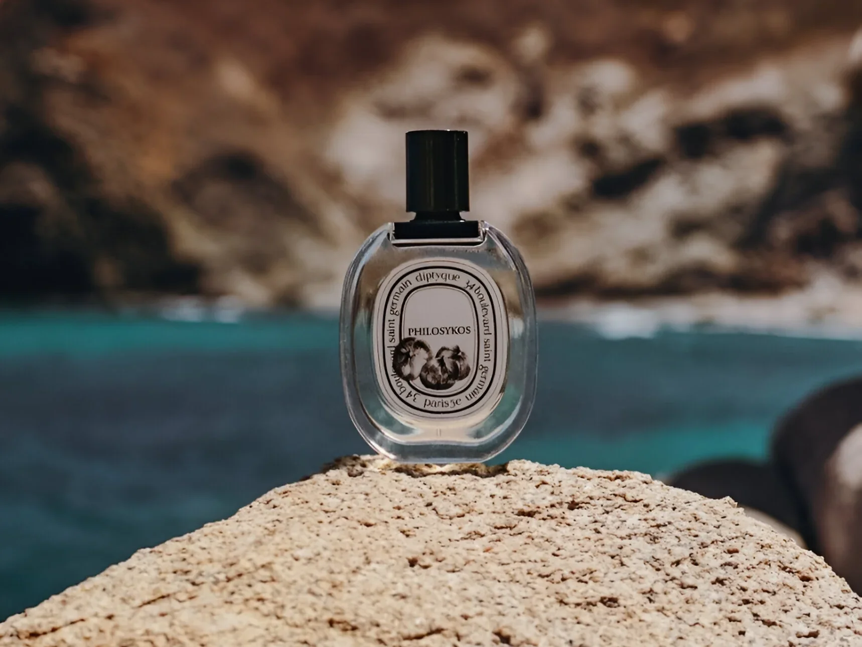 Bottle of Diptyque Philosykos perfume representing the essence of a fig tree, with woody and green notes capturing its natural beauty