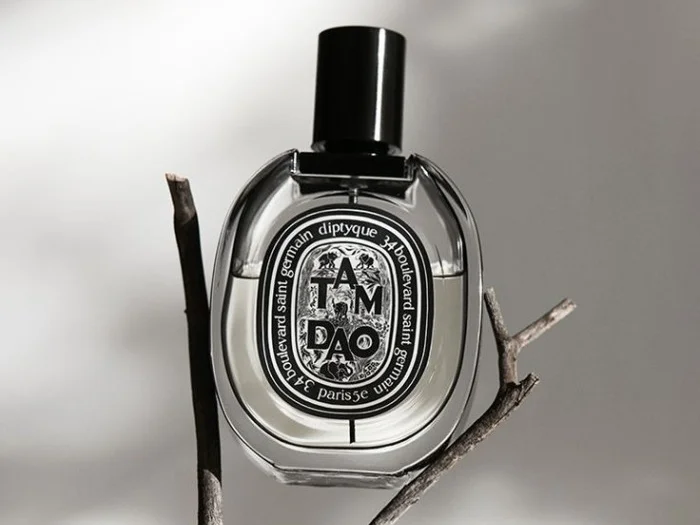 Diptyque Tam Dao perfume bottle with price tag highlighting luxury fragrance