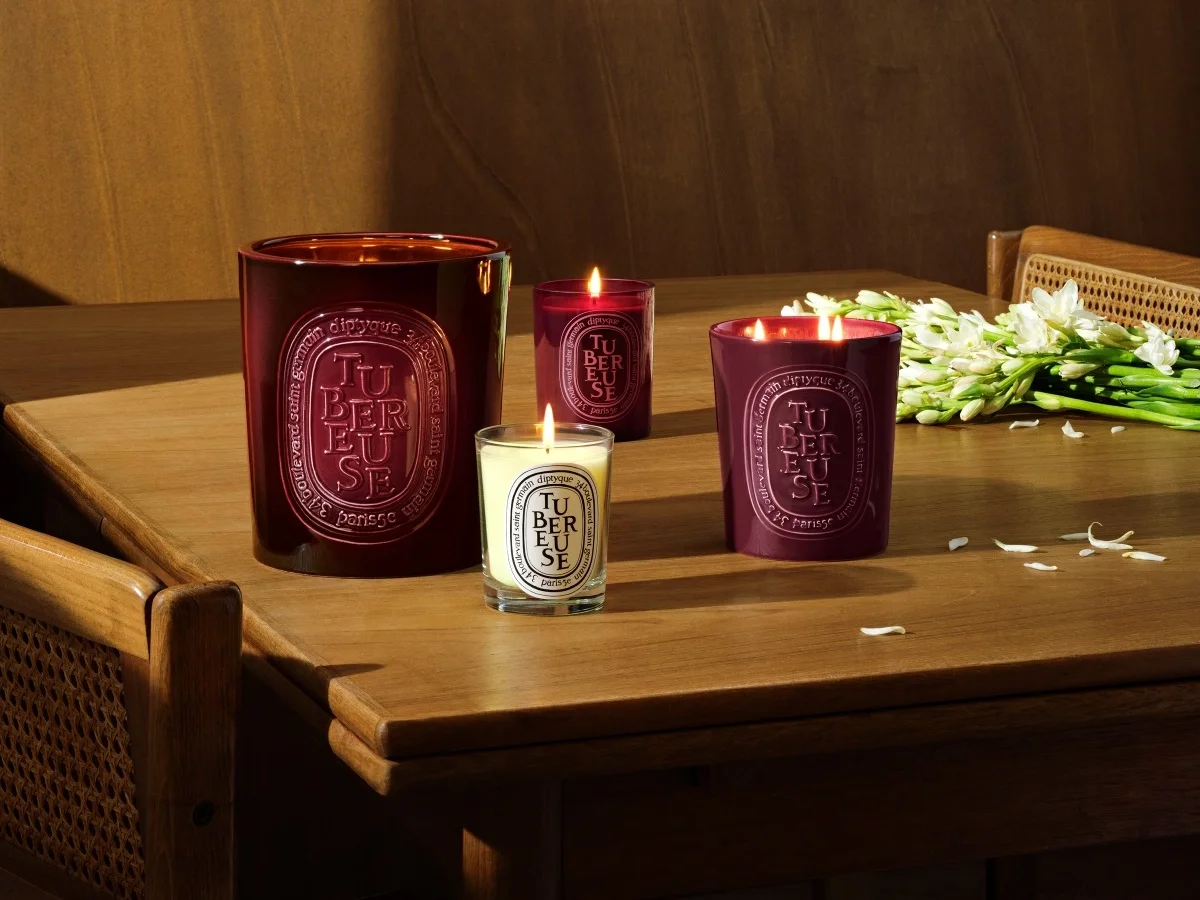 Diptyque Tuberose candle featuring a rich, exotic floral fragrance with tuberose essence in an elegant glass jar.