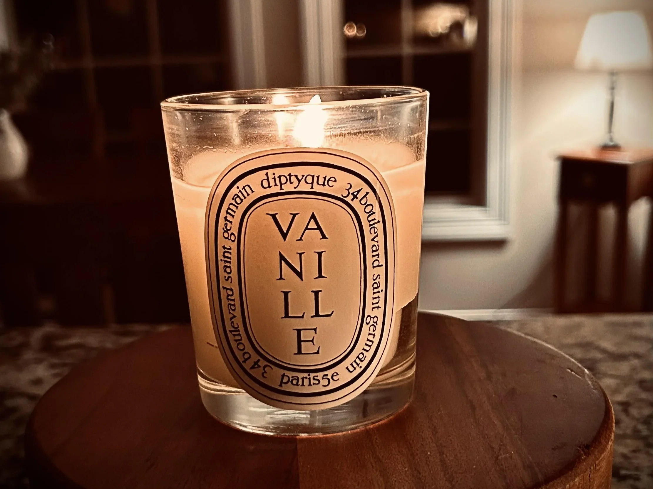 Diptyque Vanille candle with a sweet and creamy vanilla fragrance in a luxurious glass jar