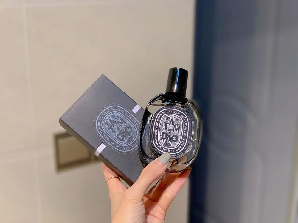 Bottle of Diptyque Tam Dao perfume with online shopping options